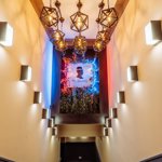 A corridor decorated in 1920s decor.