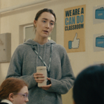 A still from a film with a teacher in a classroom.