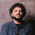 Studio portrait of Nish Kumar.