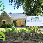 Finkle Green Bed and Breakfast exterior showing charming façade and landscaped garden.