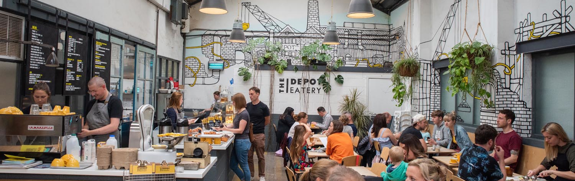 The interior of a busy coffee shop.
