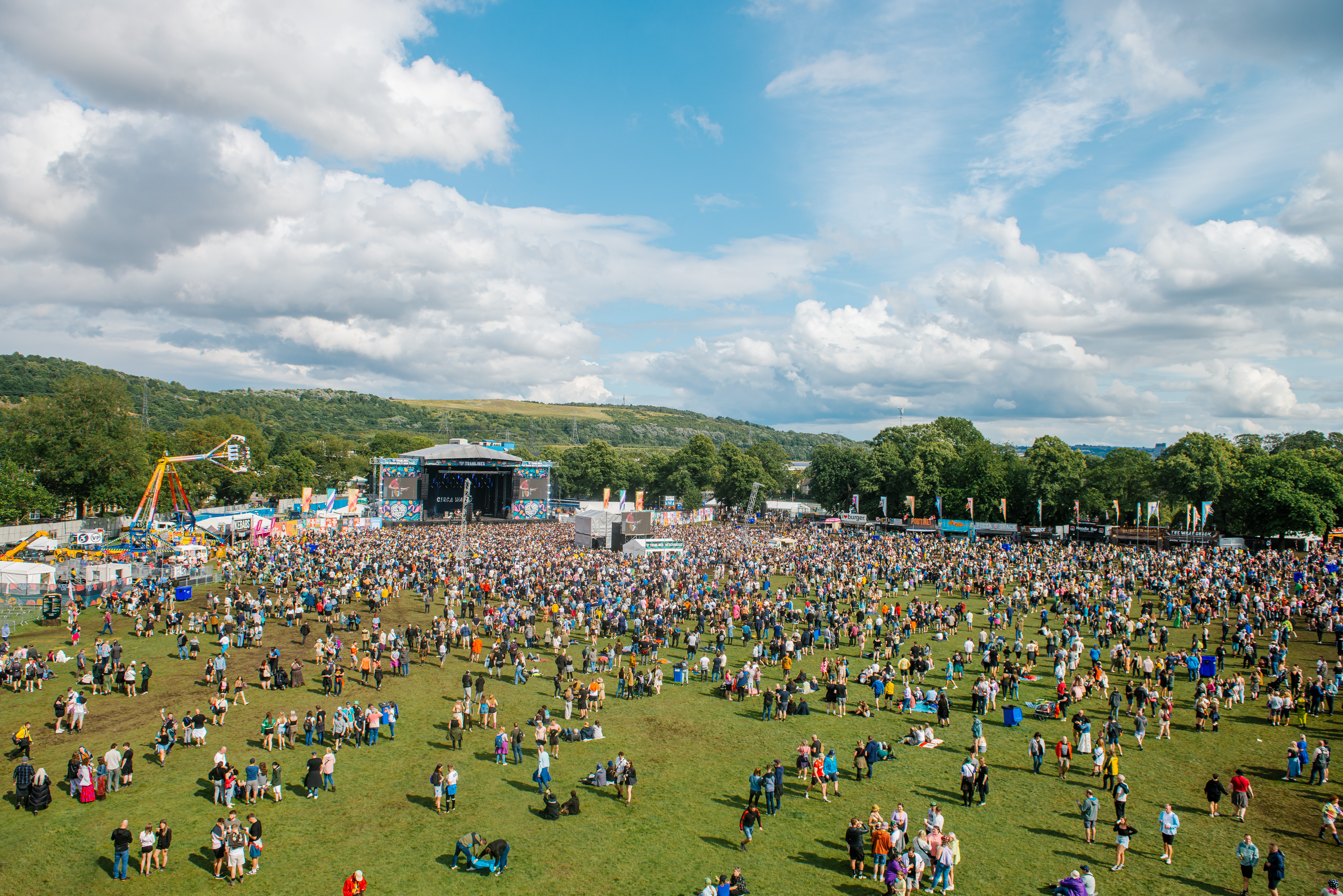 Sunny aerial shot looking down on the Tramlines main stage area 