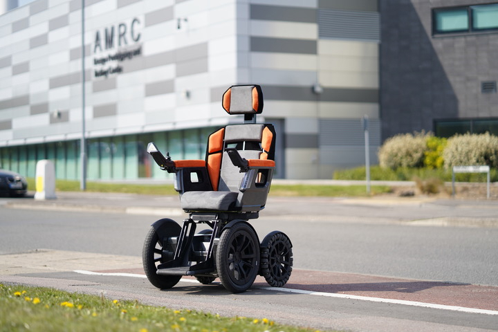 An advanced wheelchair stood by the side of a road outside the Advanced Manufacturing Research Centre in Sheffield.