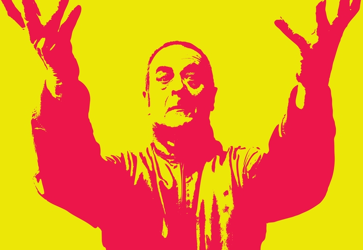 A two tone red and yellow image of Mark Thomas.