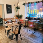 A table and chairs at Gaard Coffee Hide.