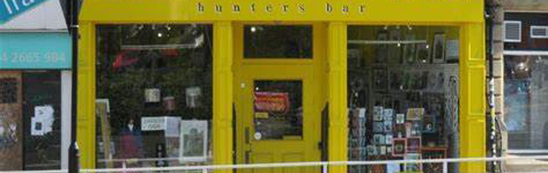 The bright yellow exterior of Sheffield Makers Hunters Bar.