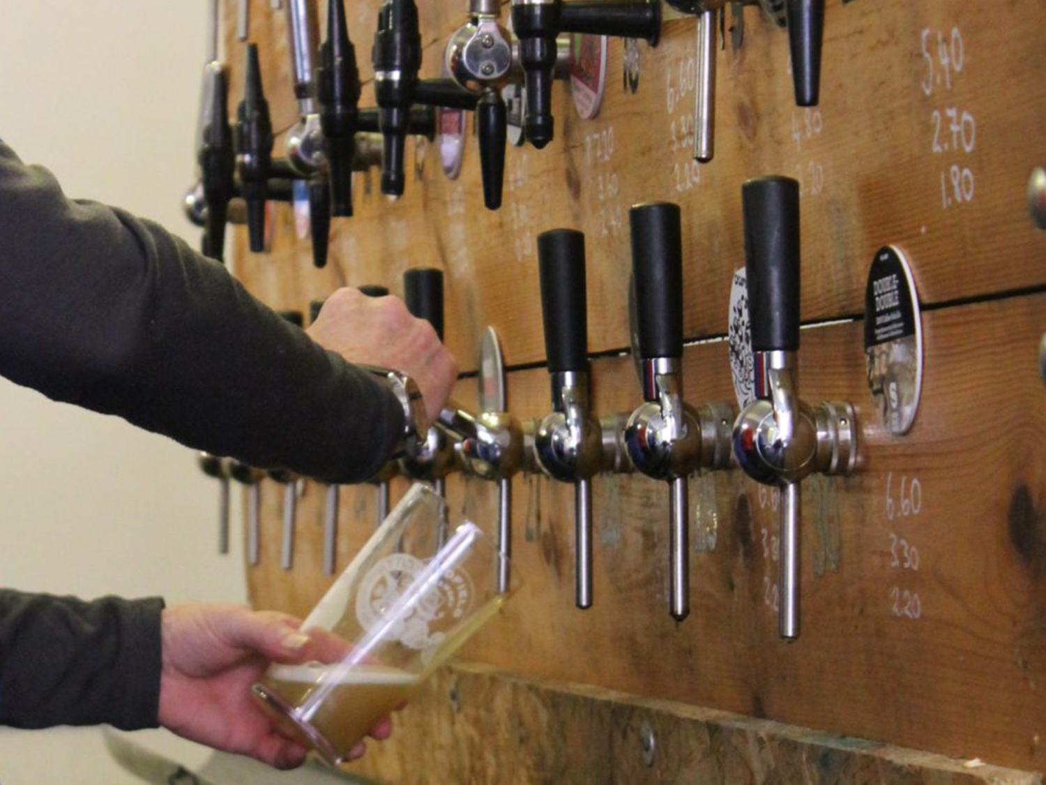 A close up of a beer being poured at the Steel City Beer And Cider Festival.