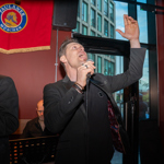 A big band performing in a bar.