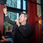 A big band performing in a bar.