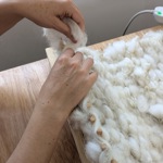 A close-up of Peg Loom Weaving.