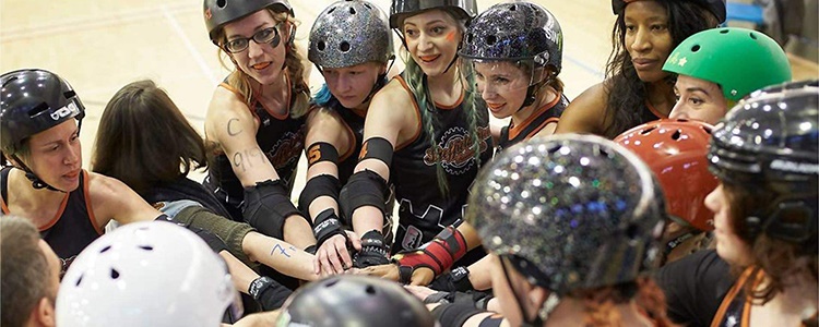 A team gets ready for a game of roller derby.
