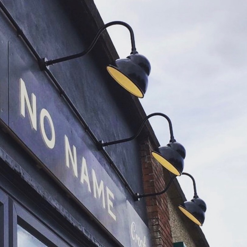 The sign above an entrance read 'No Name'.