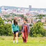 Two people exploring Sheffield'a Green Space At Meersbrook Park.