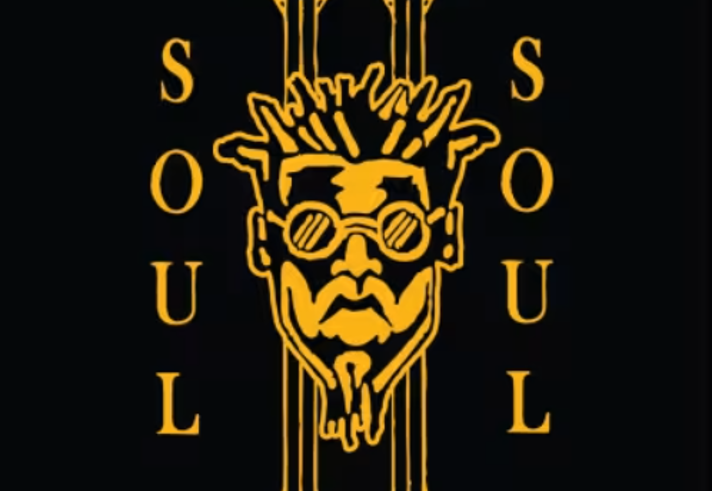 A stylised gold graphic on a black background featuring a bold Roman numeral II with the word “SOUL” written vertically on both sides. At the centre is an illustrated face wearing round sunglasses and sporting spiked hair and a pointed beard, creating a distinctive logo design. The artwork has a strong, iconic look with contrasting colours and symmetrical composition.