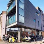 The exterior of The Grind Café.