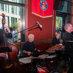 A big band performing in a bar.