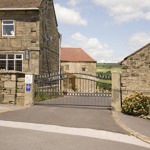Padley Farm – exterior view with driveway leading to the entrance.