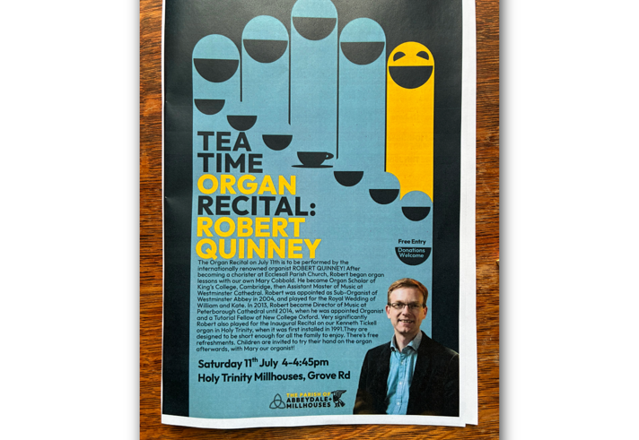 Poster advertising a “Tea Time Organ Recital: Robert Quinney,” featuring a stylised graphic of organ pipes shaped like smiling faces in blue and yellow, with teacups arranged like keys. Text notes free entry with donations welcome. Event details: Saturday 11th July, 4–4:45pm at Holy Trinity Millhouses, Grove Rd. Lower section includes a small portrait photo of the performer and descriptive text about the recital.
