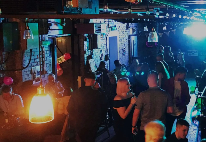 A crowd of people enjoying a night out at Toolmakers Live.