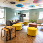 Jonas Court – communal area with seating and open space for residents.