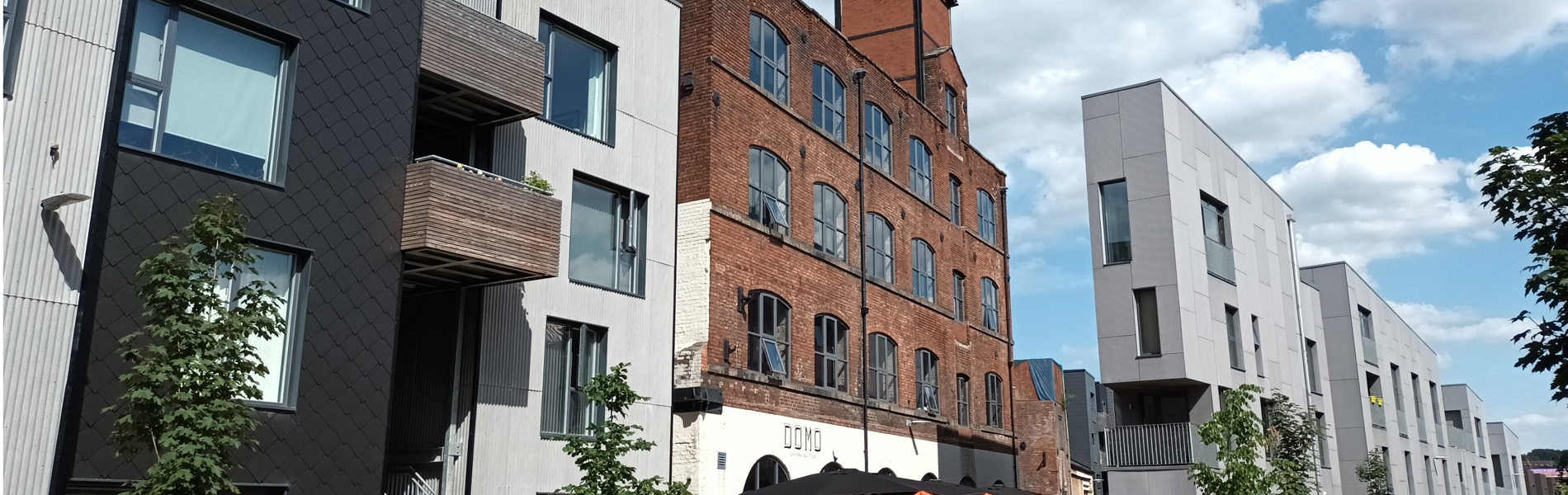 A row of buildings in Little Kelham, on a sunny day.