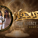Promotional graphic for “N-Dubz: The Legacy Tour 2027”. A gold and bronze arena-themed background features a circular stage and concert lighting. On the left, a round frame shows three performers in coordinated stage outfits beneath the text “Performing in the Round” and “360° Arena Experience”. Large gold lettering across the centre reads “N-Dubz” with “The Legacy Tour 2027” underneath. The design uses metallic effects and bright spotlight accents.