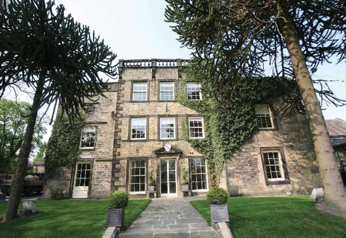 Best Western Plus Mosborough Hall Hotel surrounded by trees and gardens.