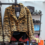 A fake tiger skin coat for sale in the Red Brick Market.