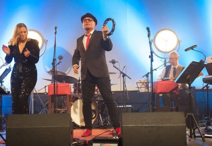 A band performing live on stage.